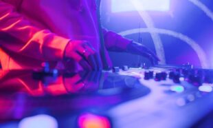 DJ playing the decks at Lancashire Mind's Club Feelgood event