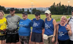 Summer solstice walking challenge - 17 hours after starting the walk, the group taking part are now finished at sunset